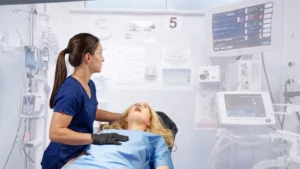 A nurse at UMaine Fort Kent watches a simulated monitor